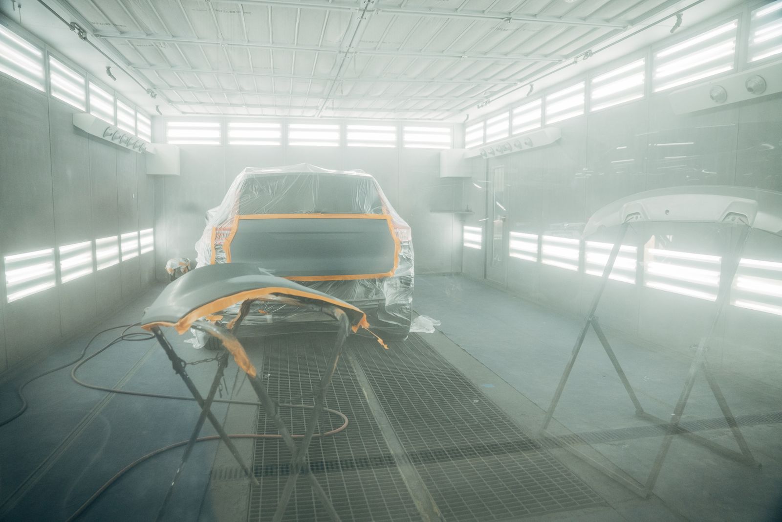 Car masked and painted in the paint booth