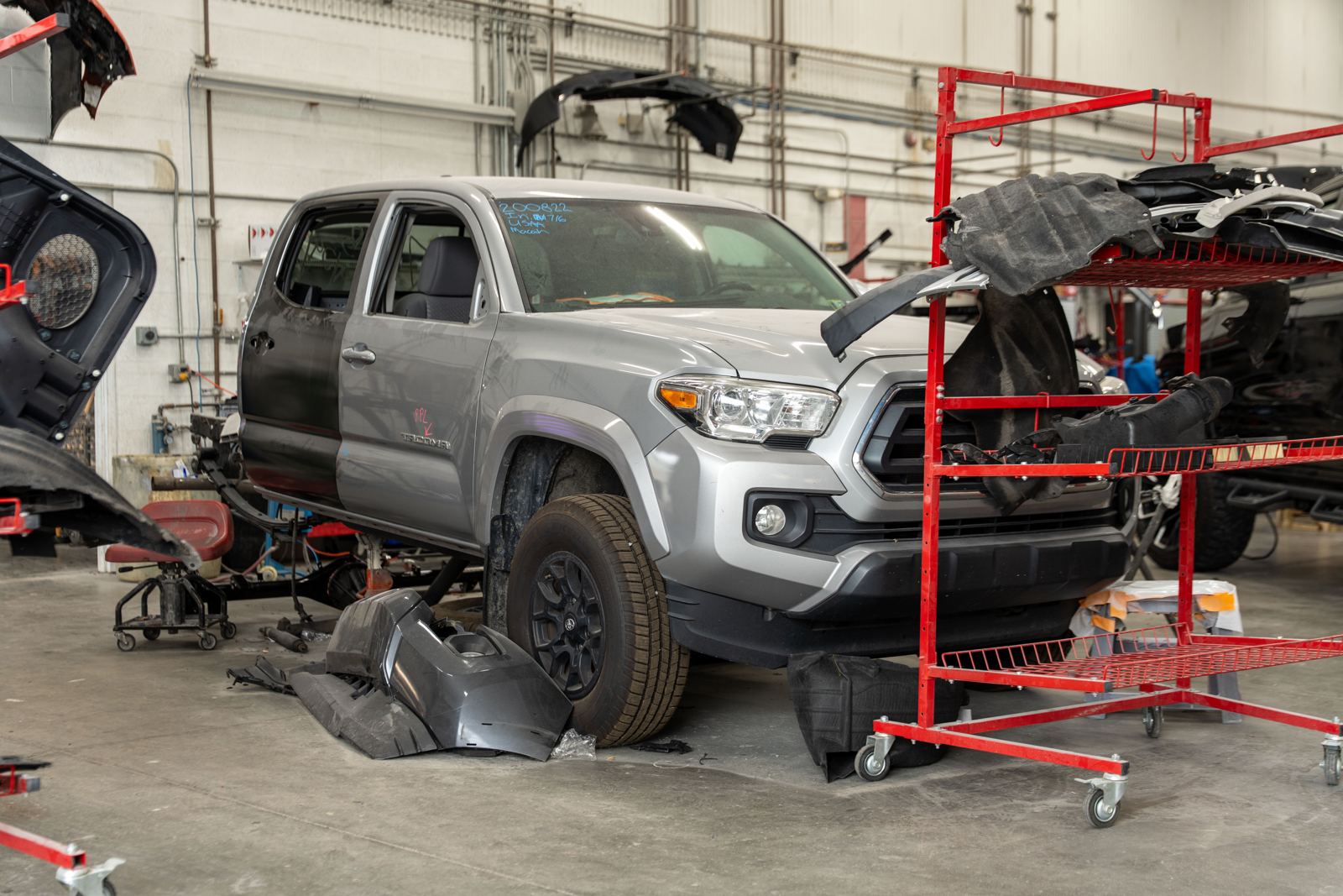 A Toyota Tacoma being repaired on the shop floor